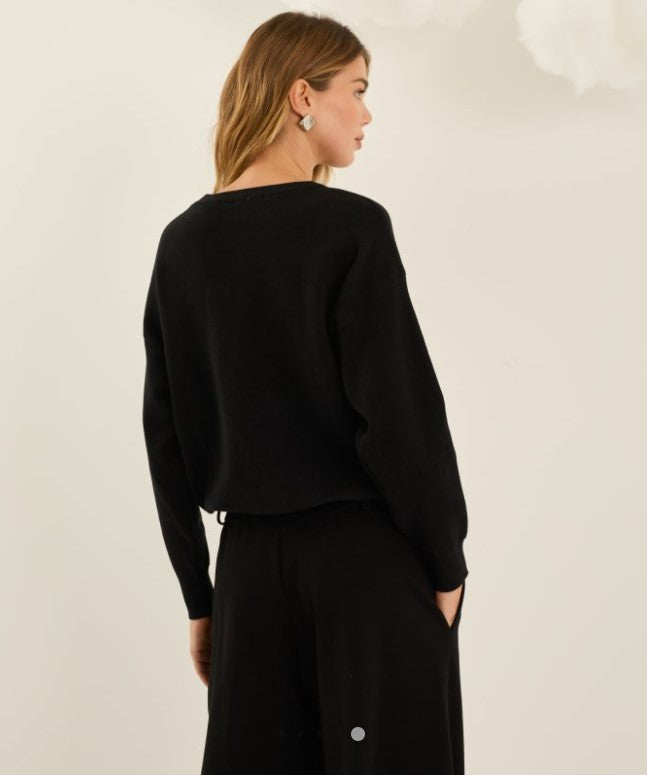 Maglia viscosa con ricamo viso e applicazione strass