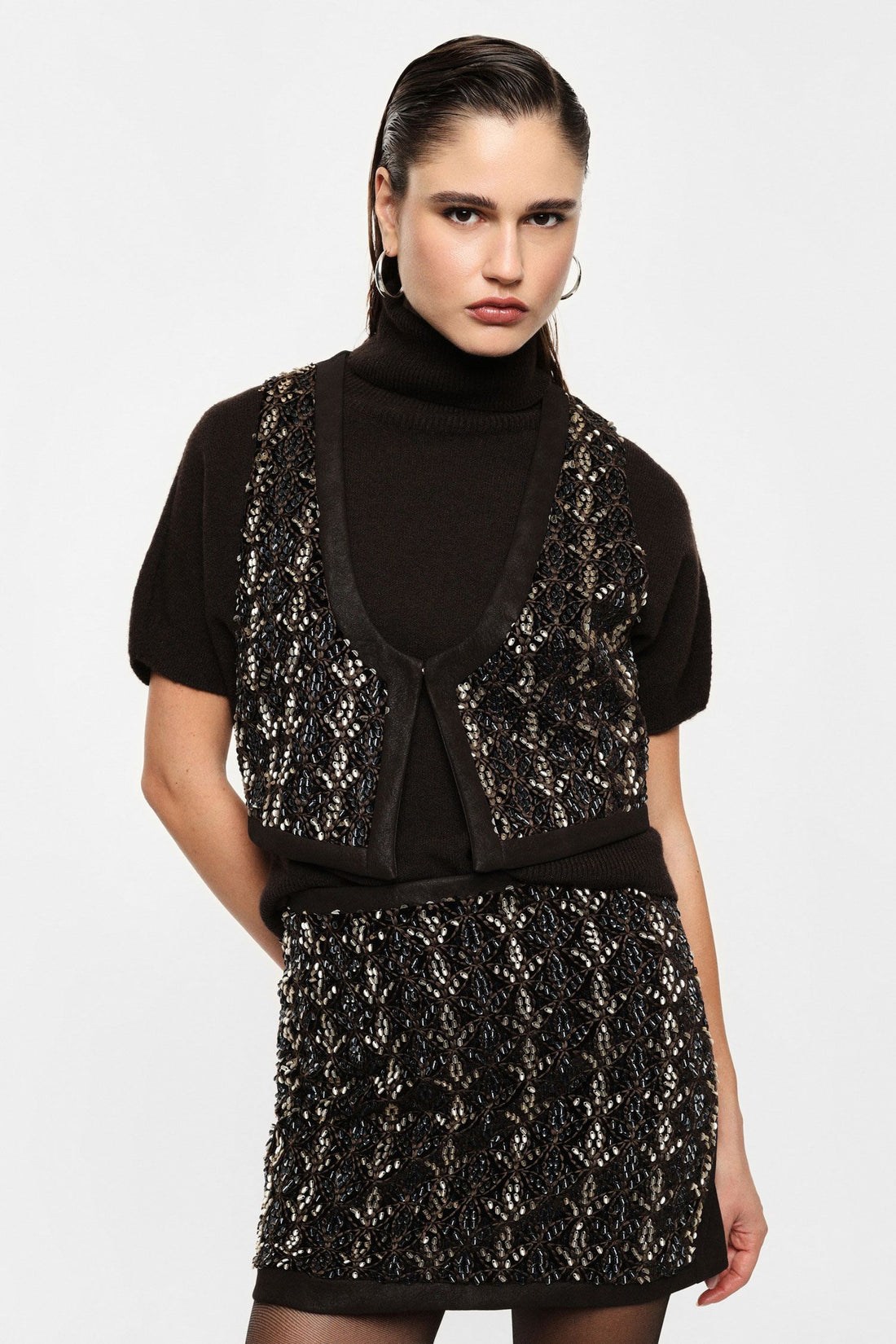 Gilet senza maniche con ricamo geometrico