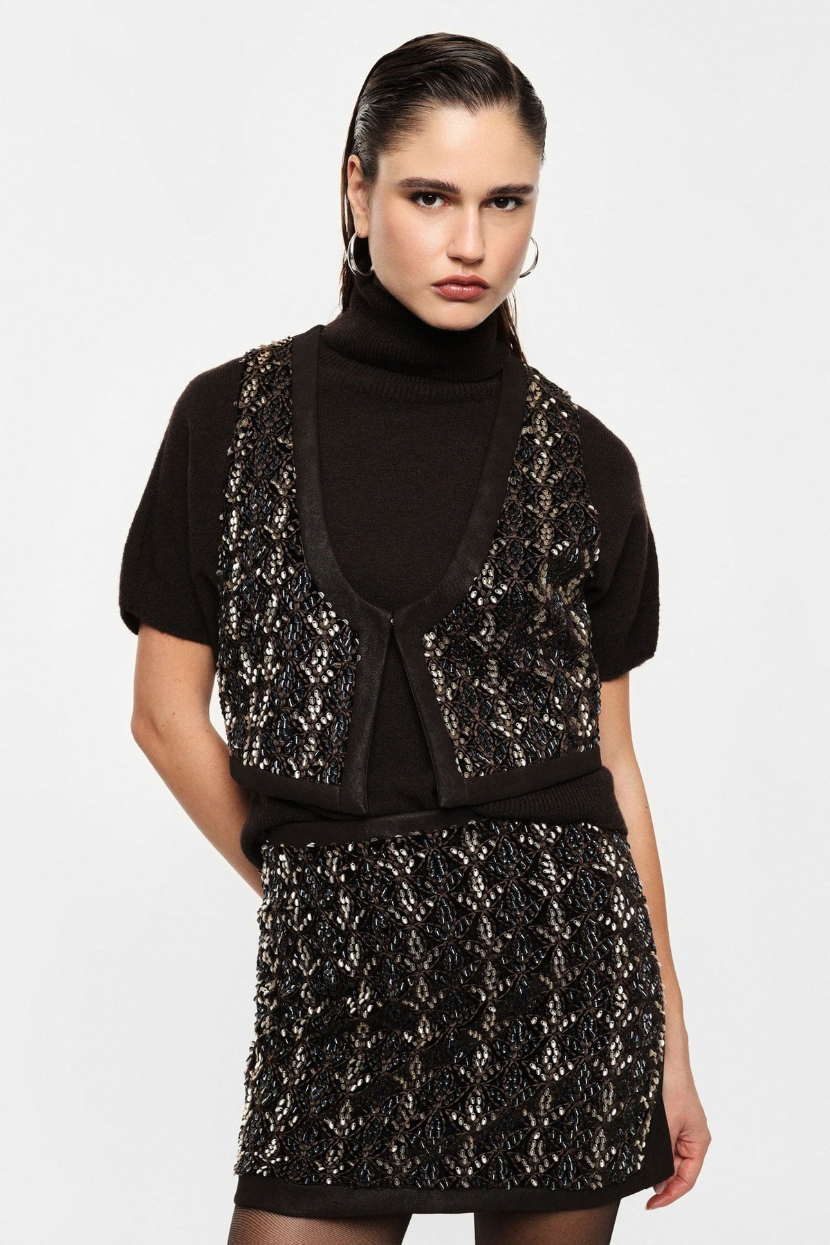 Gilet senza maniche con ricamo geometrico