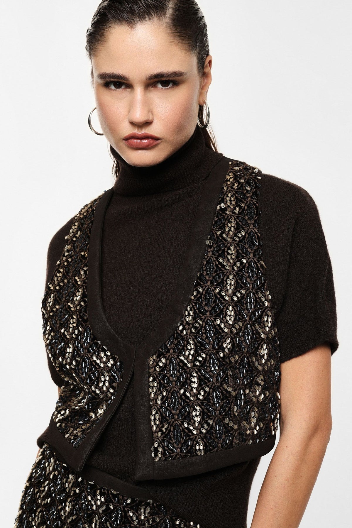 Gilet senza maniche con ricamo geometrico