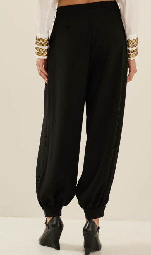 Pantalone con polsino alla caviglia