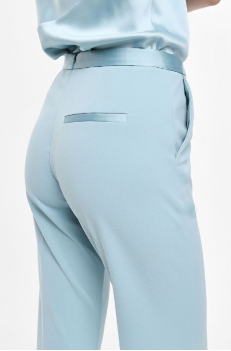 Pantaloni flare sartoriali vita alta pinces