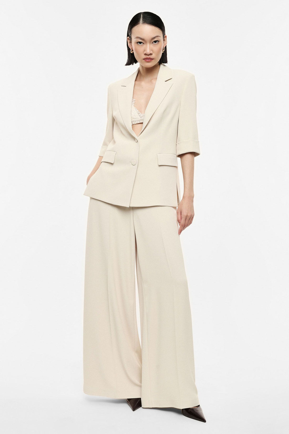 Pantaloni palazzo a vita alta con cintura