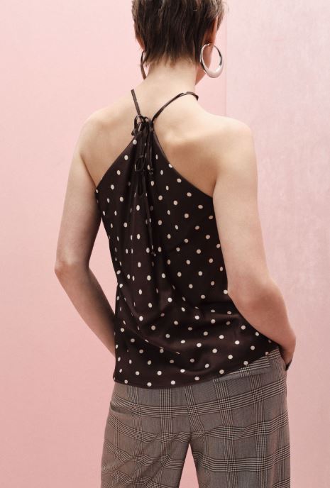 Top con spalline sottili in pizzo e pois