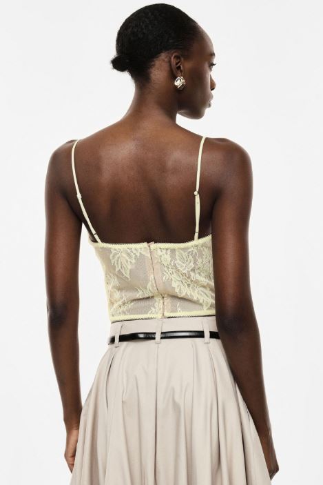 Top cropped con spalline e ricamo floreale